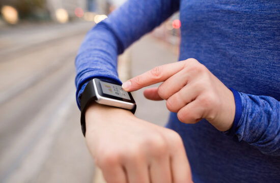 graphicstock hands of unrecognizable young woman running in the city using a fitness app on her smartwatch for tracking weight loss progress running goal or summary of her run rear view BdHqD2HzZ
