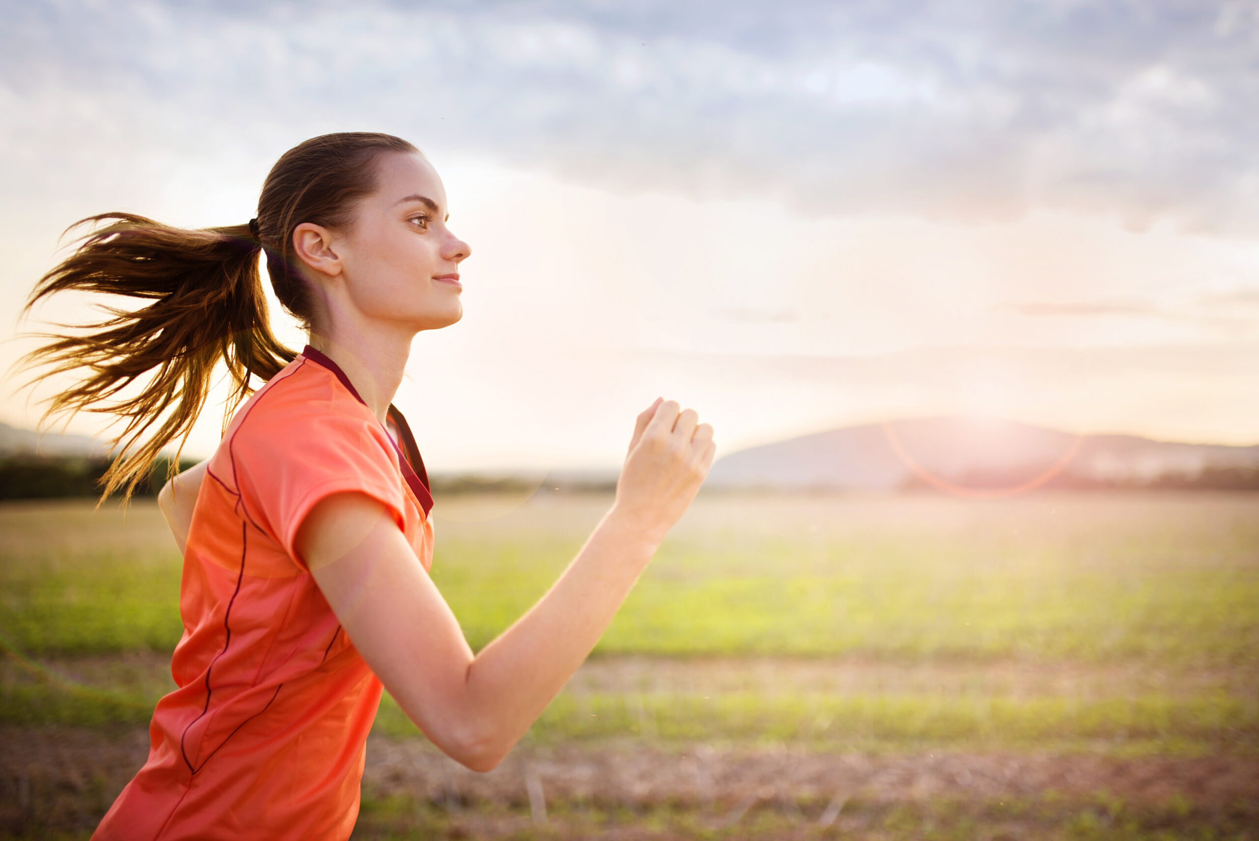 Dieting for Beginners: A Comprehensive Guide 4 graphicstock cross country trail running woman at sunset runnerwoman exercising outside as part of healthy lifestyle rCmqv5hZ scaled