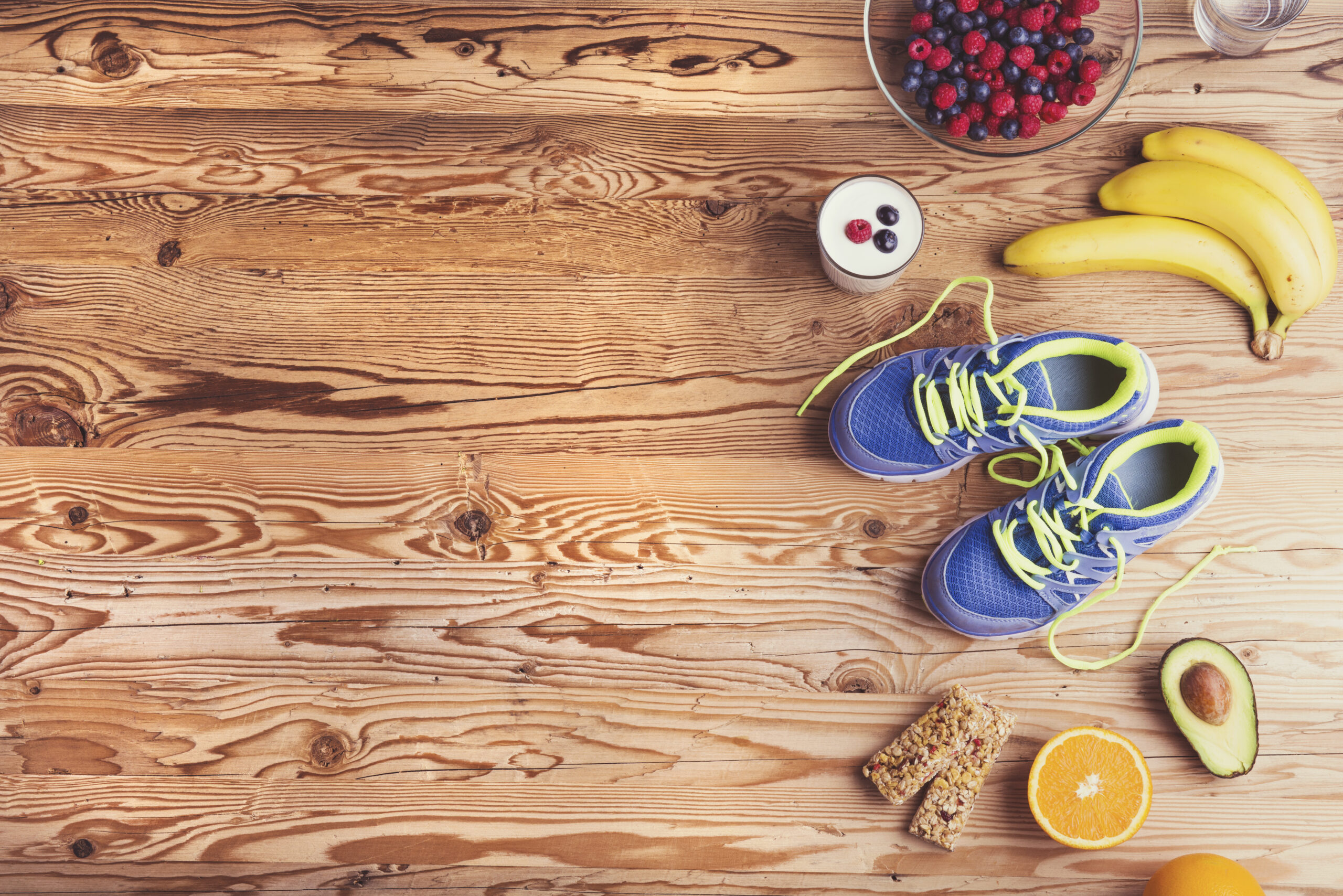 Ditch the Fad Diets! Try These Healthy, Sustainable Habits Instead 5 graphicstock pair of running shoes and healthy food composition on a wooden table background HRkgN 6WZ 1 scaled