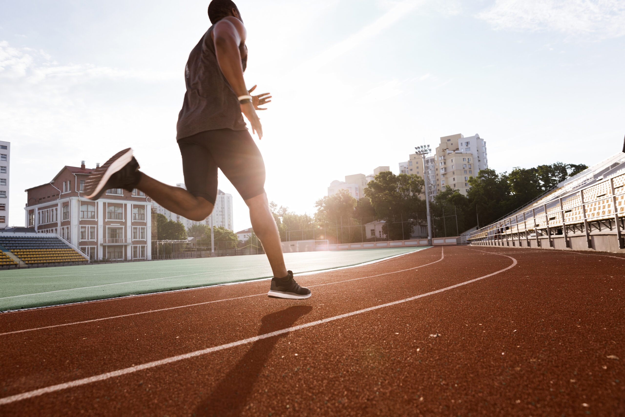 5 Myths About Dieting That You Need To Stop Believing Now 4 storyblocks athlete african man running on racetrack at a stadium S0GIuvhTqZ scaled