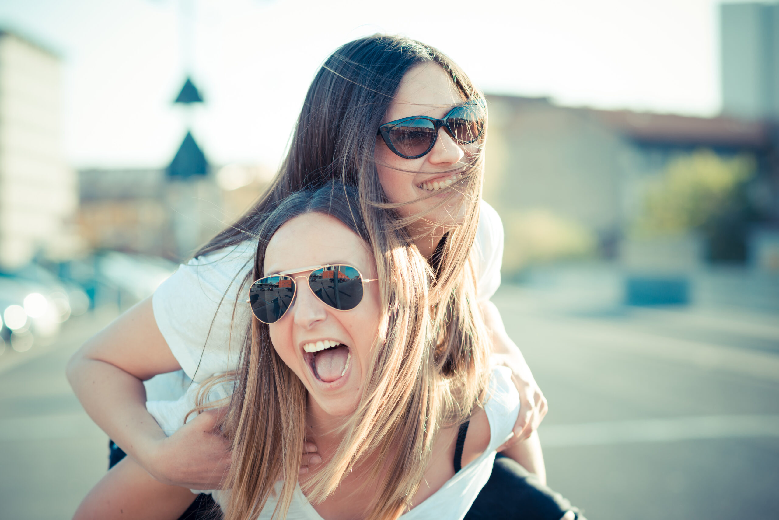 graphicstock two beautiful young women having fun in the city BxZzVv4 eb scaled